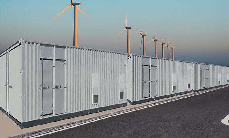 Containerized energy storage system at a wind power facility